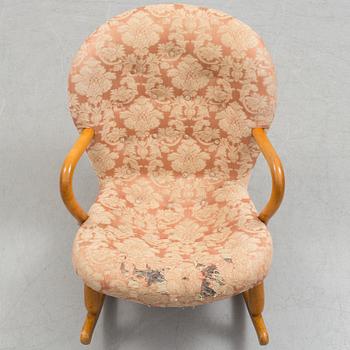A rocking chair attributed to Philip Arctander.