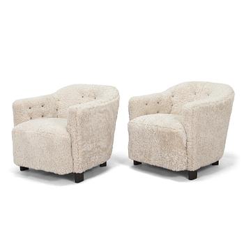 A pair of  1930s/40s. 'Continent' armchairs model 217, Asko, Finland.