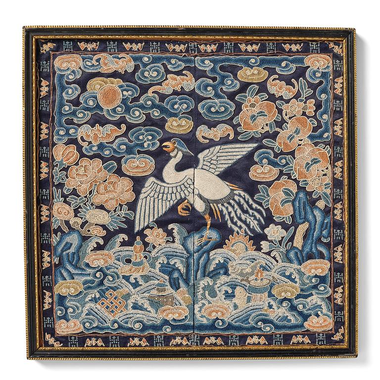 A civil offical's rank badge with a silver pheasant in Peking knot, Qing dynasty, early 19th century.
