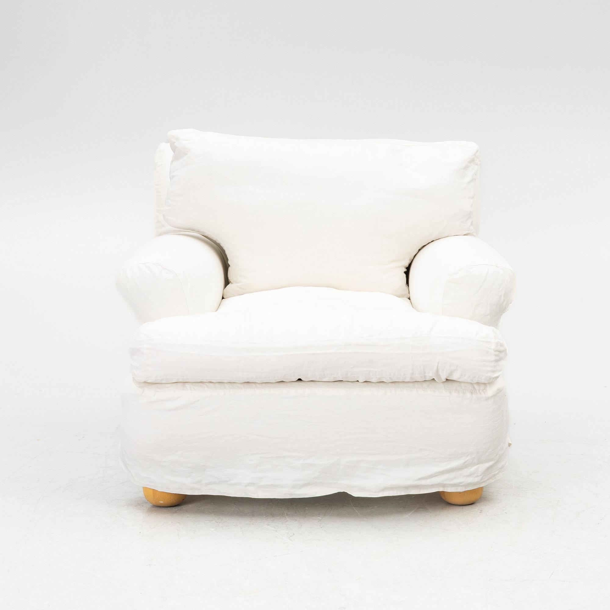 An armchair, contemporary.