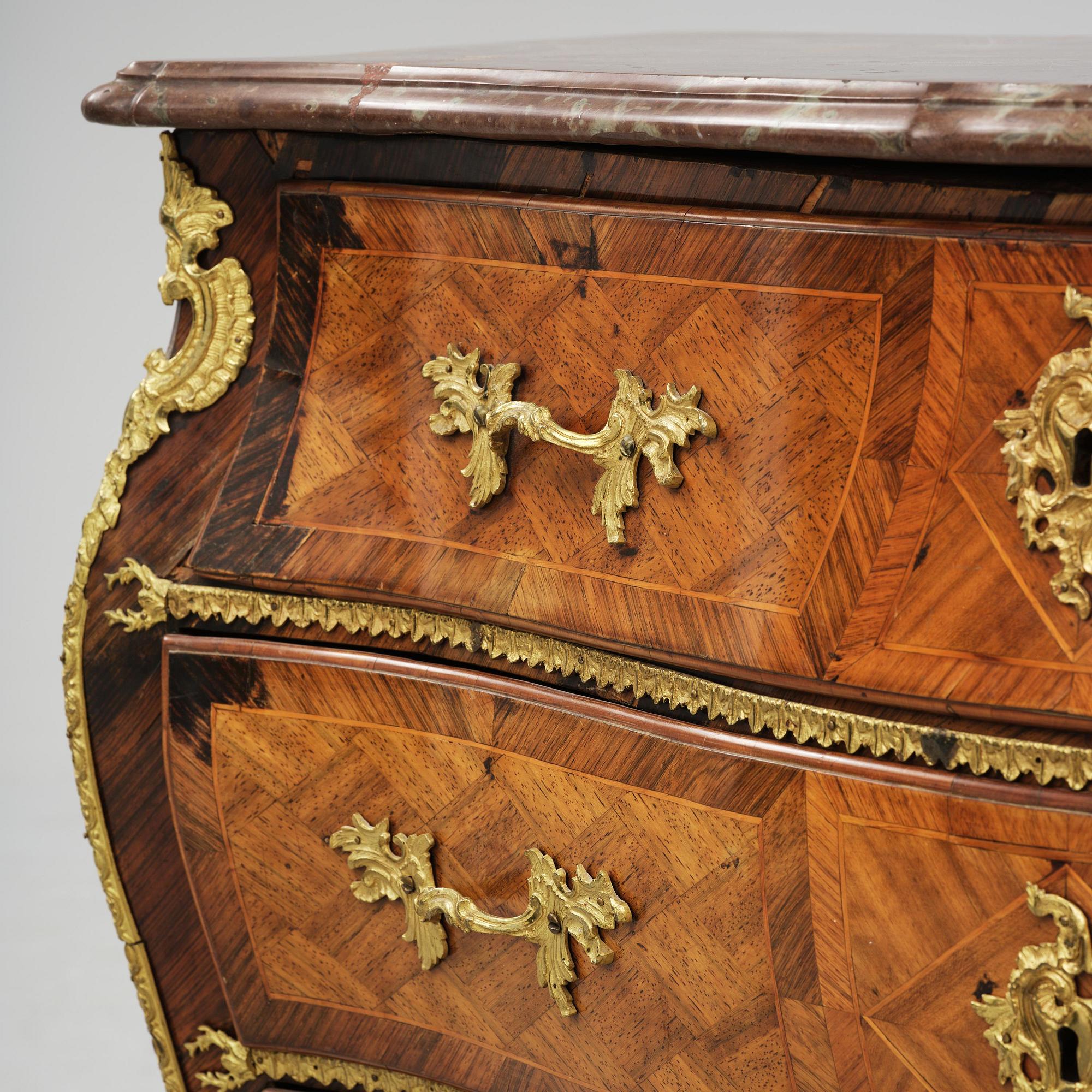 A parquetry and ormolu mounted rococo commode attributed to C. Tietze (master in Stockholm 1764.91).