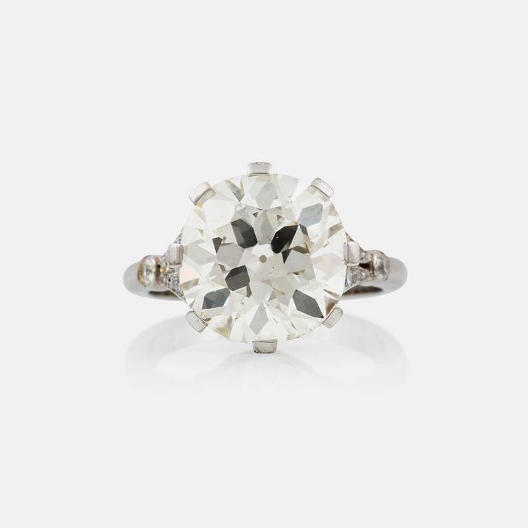 An old-cut, slightly cushion-shaped diamond, ca 5.70 cts. Quality circa L/SI.