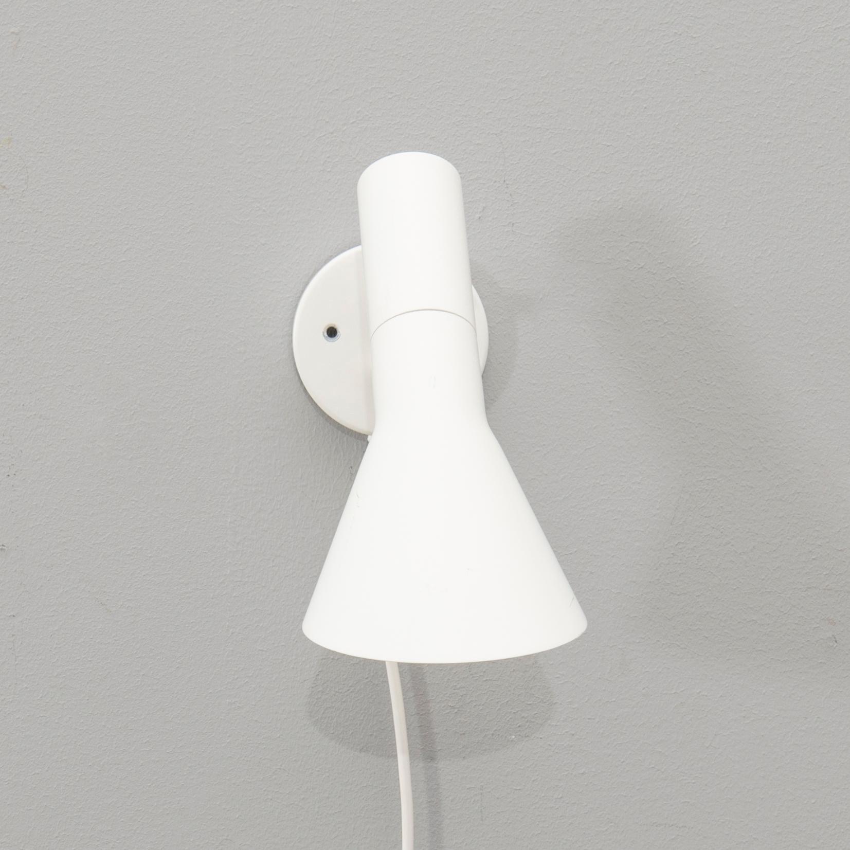 Arne Jacobsen, wall lamp "AJ" for Louis Poulsen 21st century.