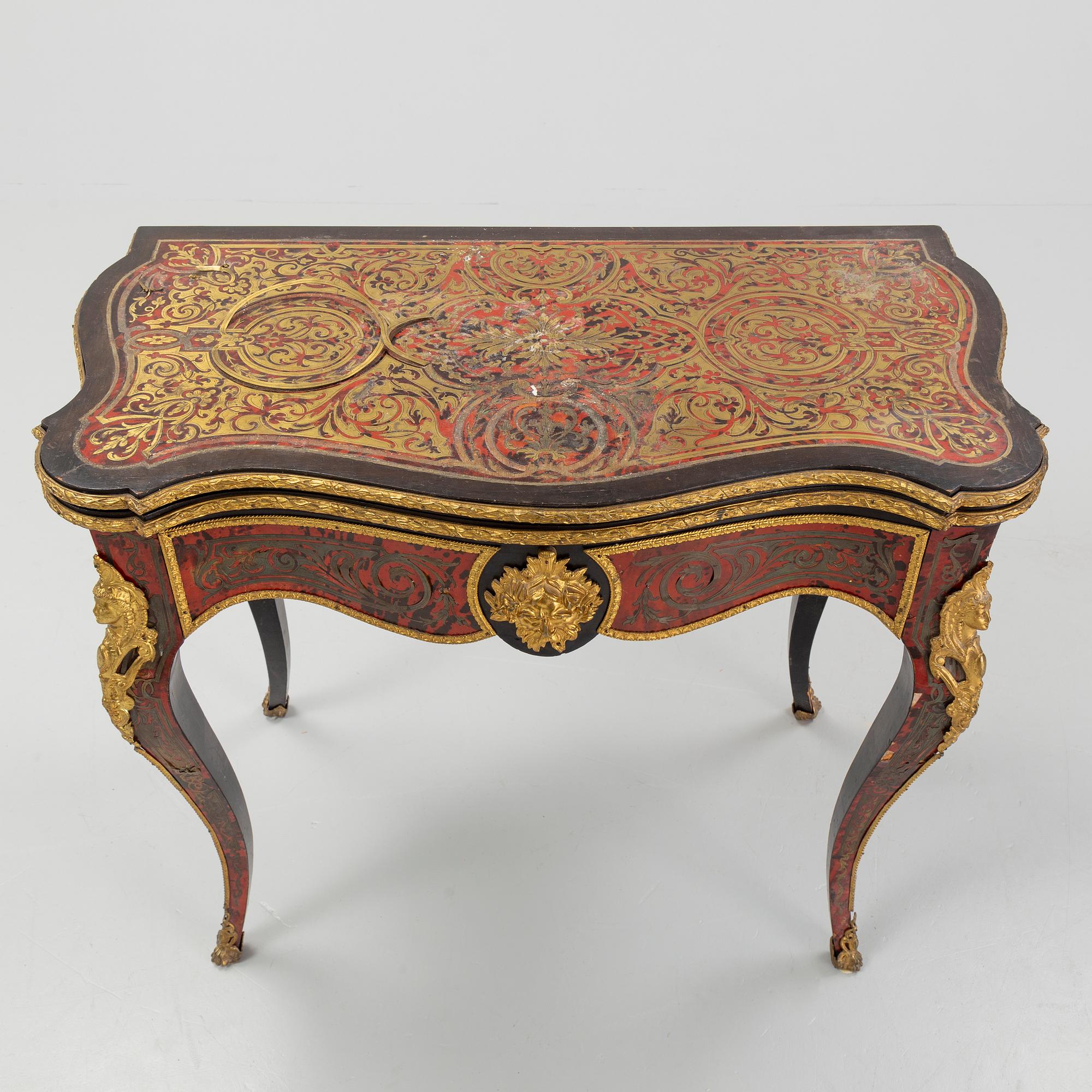 A Boulle style card table, end of the 19th Century.