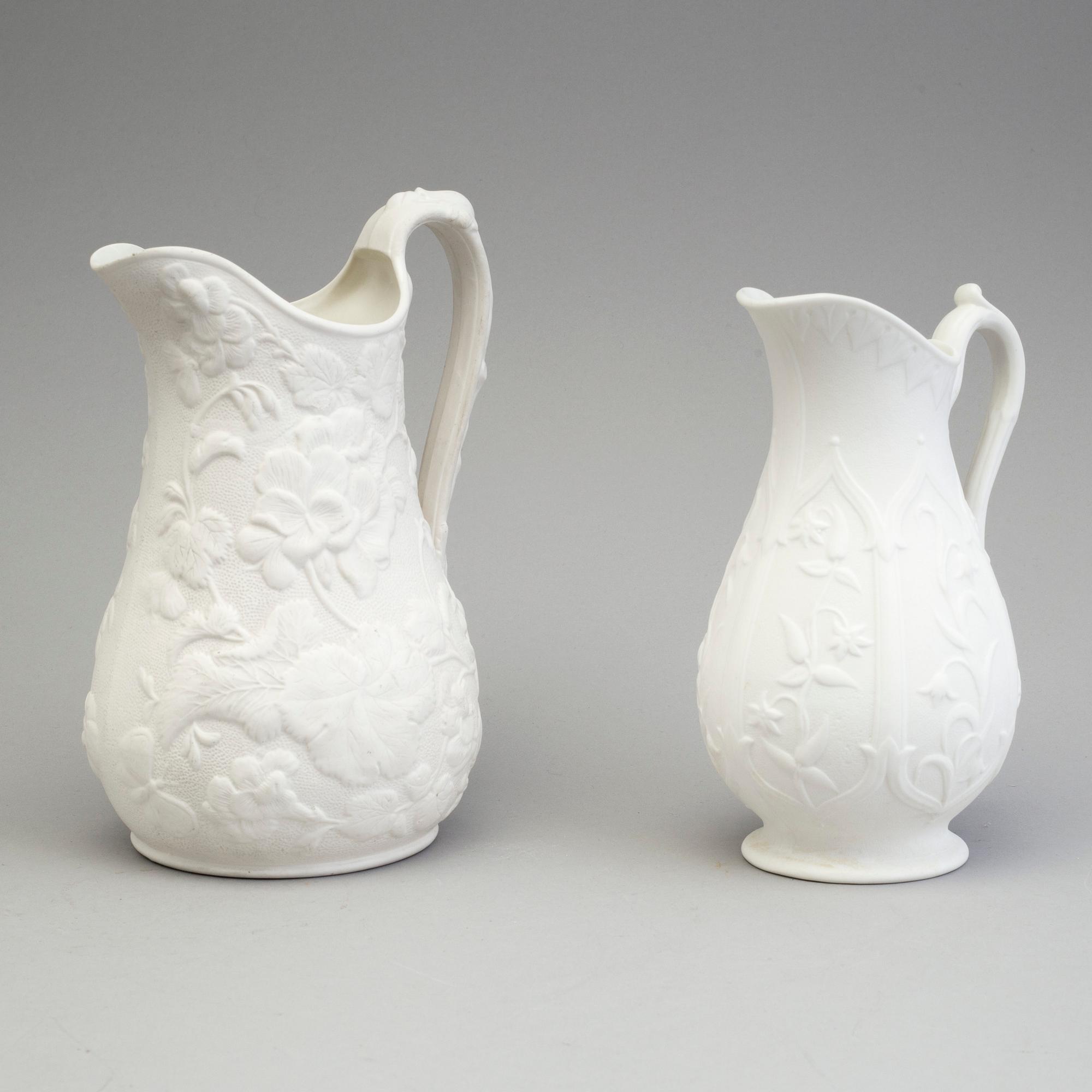 FIVE SIMILAR PARIAN JUGS, Gustafsberg, second half of the 19th century.