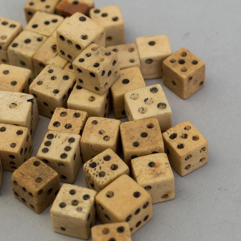 A OCLLECTION OF 36 BONE MINIATURE DICE, 19th century.