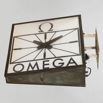 Reklamklocka, Omega, 1900-talets andra hälft.