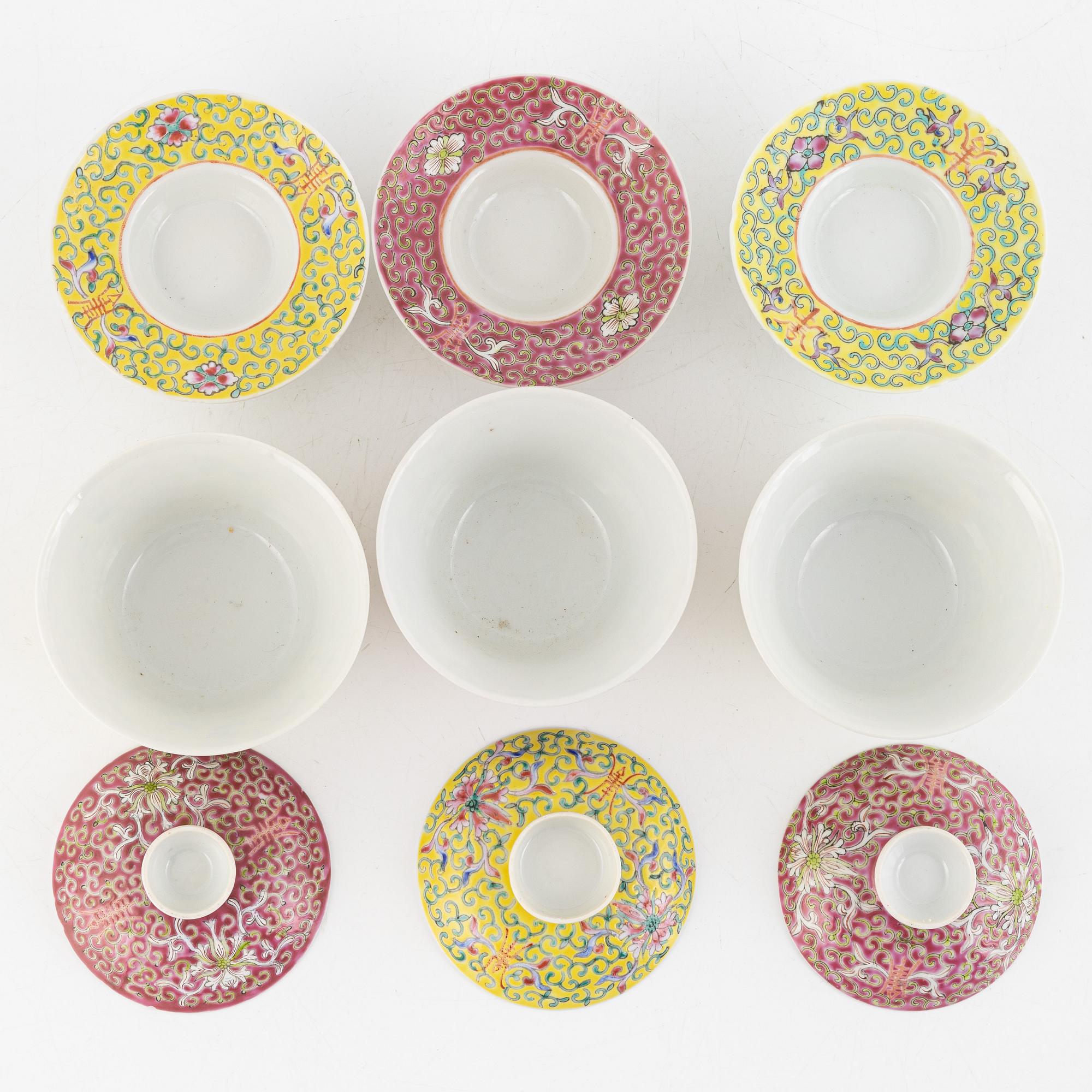 A group of three Chinese enamelled porcelain cups with covers and stands, three small dishes, 20th century.