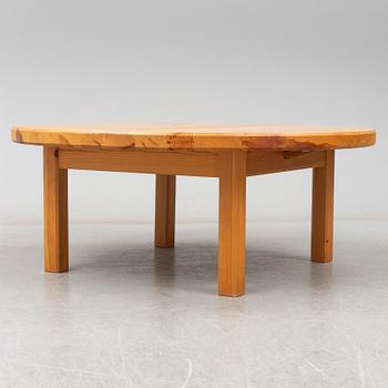 a 1970's pine coffee table.