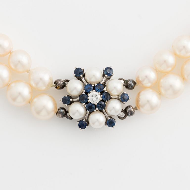 A two strand cultured pearl necklace.