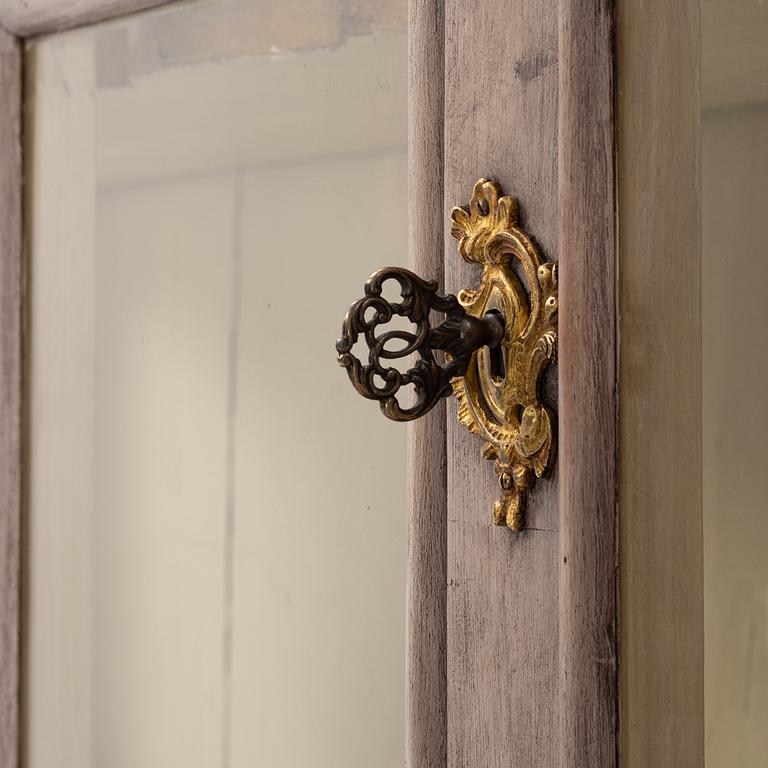A painted Rococo style cabinet, early 20th Century.