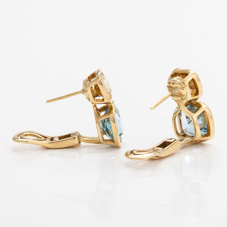 Cassandra Goad, a pair of 18K gold earrings with topazes and citrines. London.