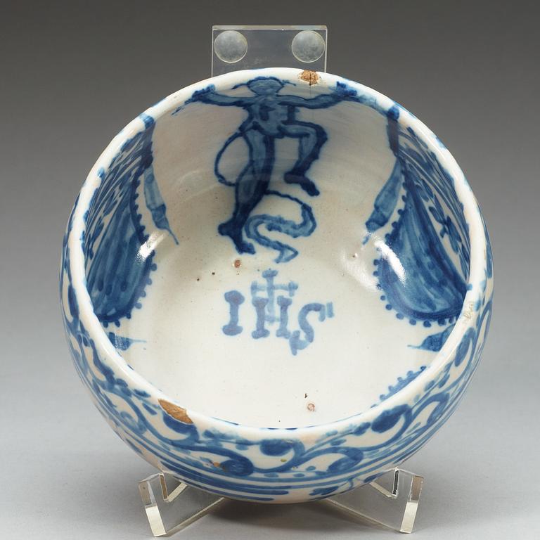 A Spanish faience blue and white bowl. Marked Talavera, presumably 18th Century.