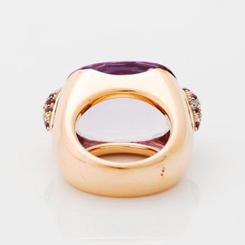 A Pomellato ring set with amethysts and round brilliant-cut diamonds.