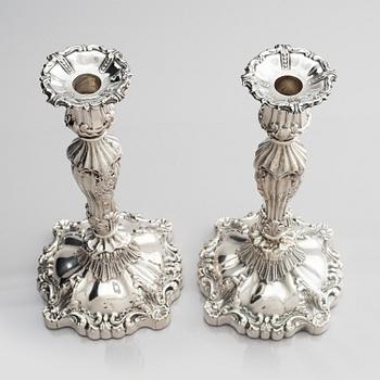 A pair of silver candlesticks, marks Gustaf Möllenborg, Stockholm 1845.