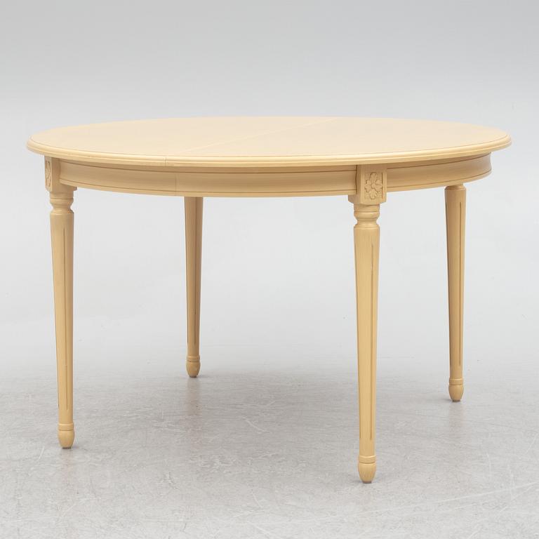 A Gustavian style dining table with six dining chairs, Sweden, 21st century.