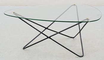 A Jacques Tournus glass and metal sofa table by Airborne.