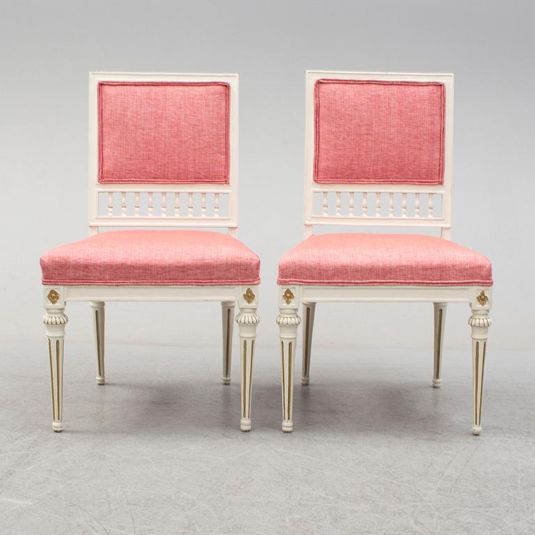 A pair of circa 1800 chairs.