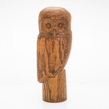 Gunnar Uotila, a wooden sculpture signed -56-.