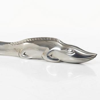 Firma Svenskt Tenn, Candelabrum, 'Vänskapsknuten', and paper knife, 'Alligator'.