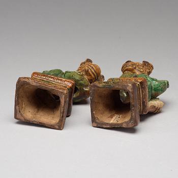 A pair of green and yellow glazed joss stick holders, Ming dynasty (1368-1644).