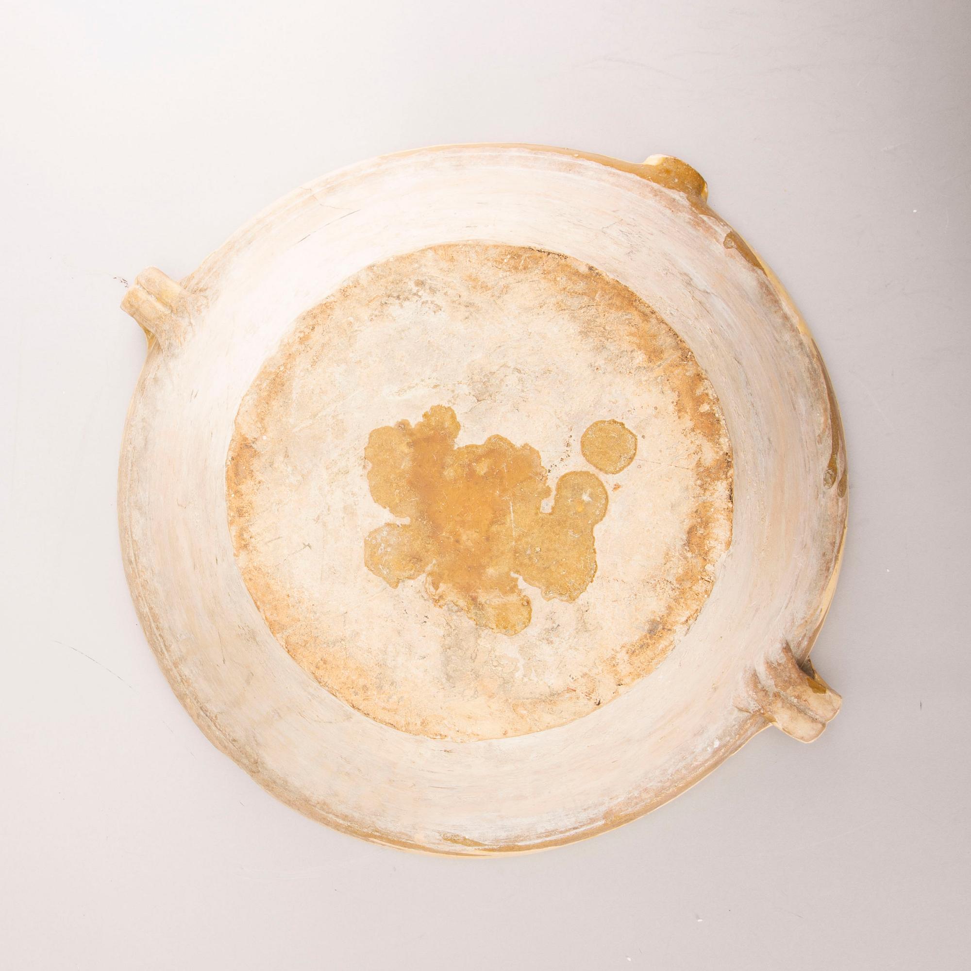 A French bowl, glazed earthenware, around 1900.