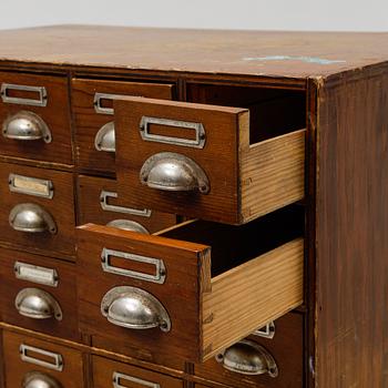 A pine cabinet with drawers, first half of the 20th Century.