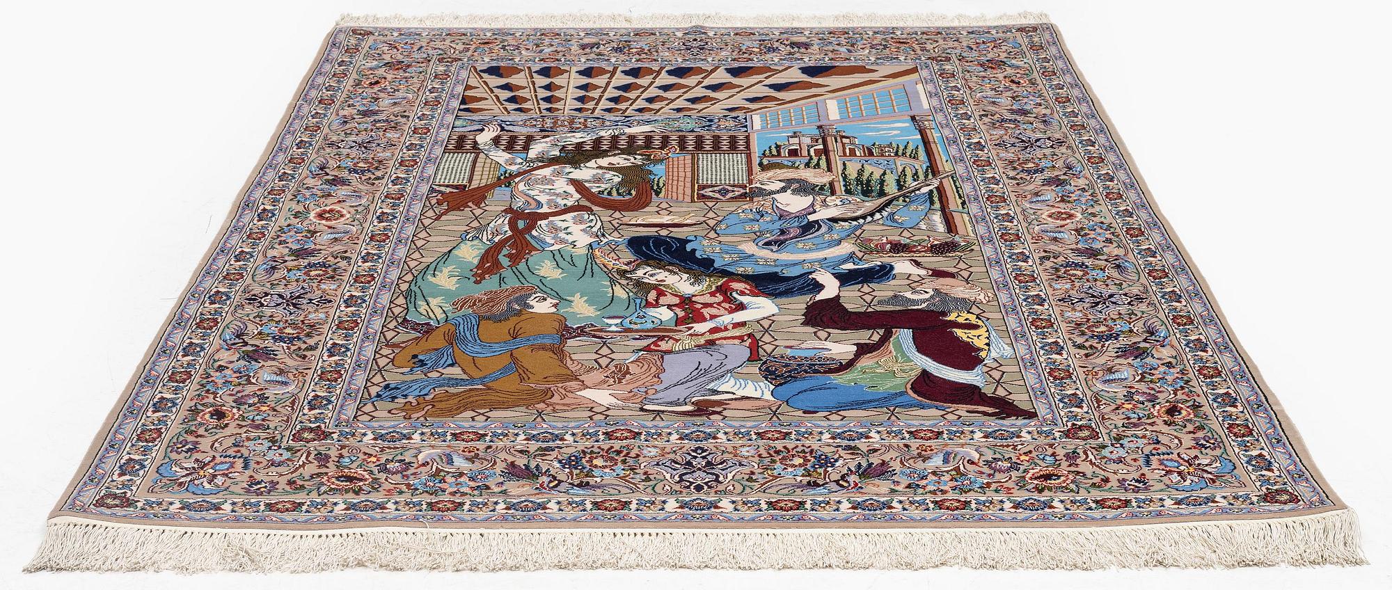 A pictoral Isfahan rug, part silk, c. 241 x 155 cm.