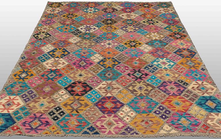 A CARPET, kilim, around 290 x 210 cm.