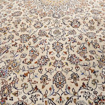 A Keshan rug, 340 x 236 cm.
