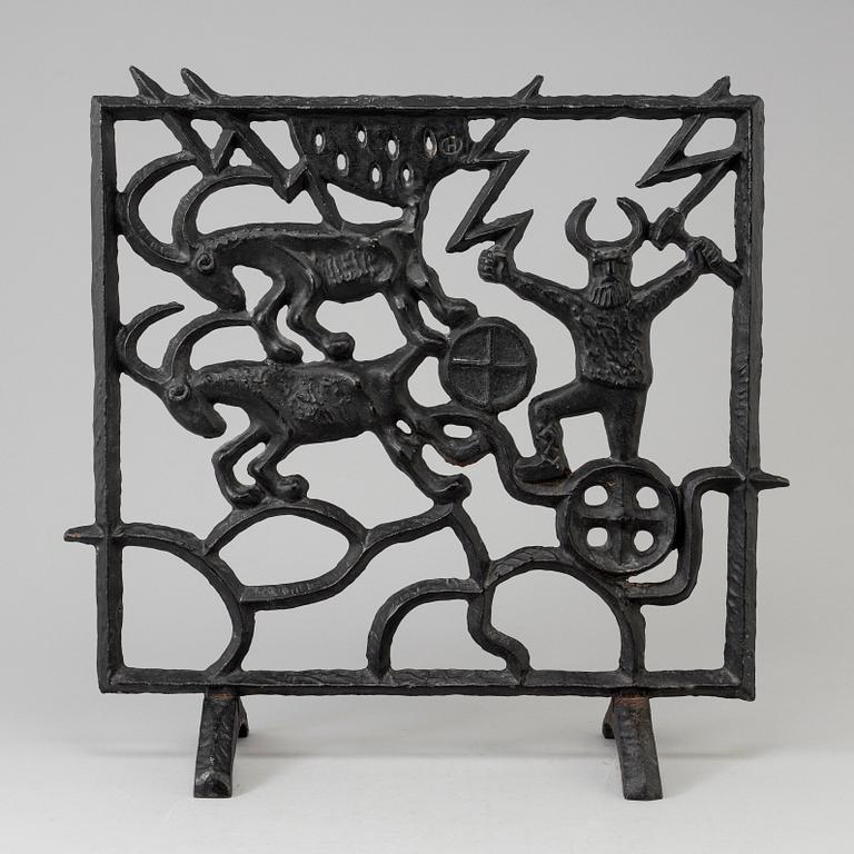 A cast iron fire shield by Olle Hermansson, Husqvarna.
