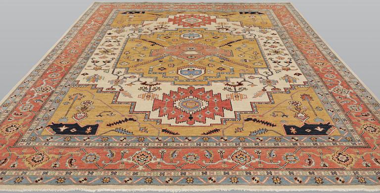 A carpet, Heriz design, approx. 351 x 269 cm.