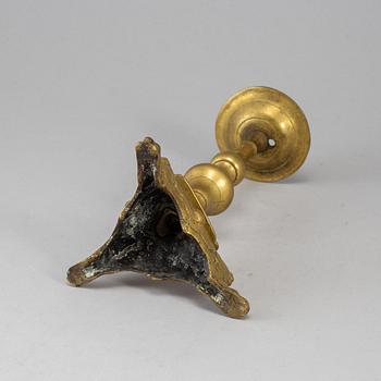 A bronze candlestick, 17th/18th century.