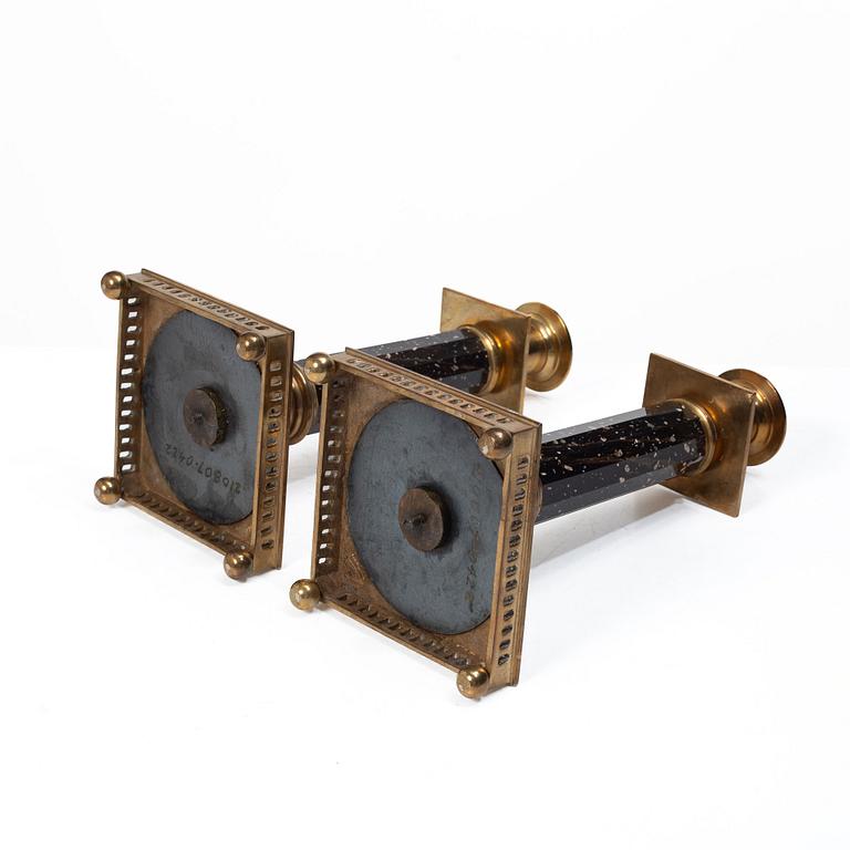 A pair of candlesticks brass and porphyry, EOS Jönköping, 20th century.