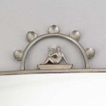Two pewter wall sconces from Firma Svenskt Tenn, 1925.