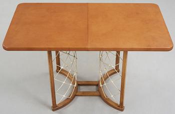 A modernist oak based table, 1940-50's.