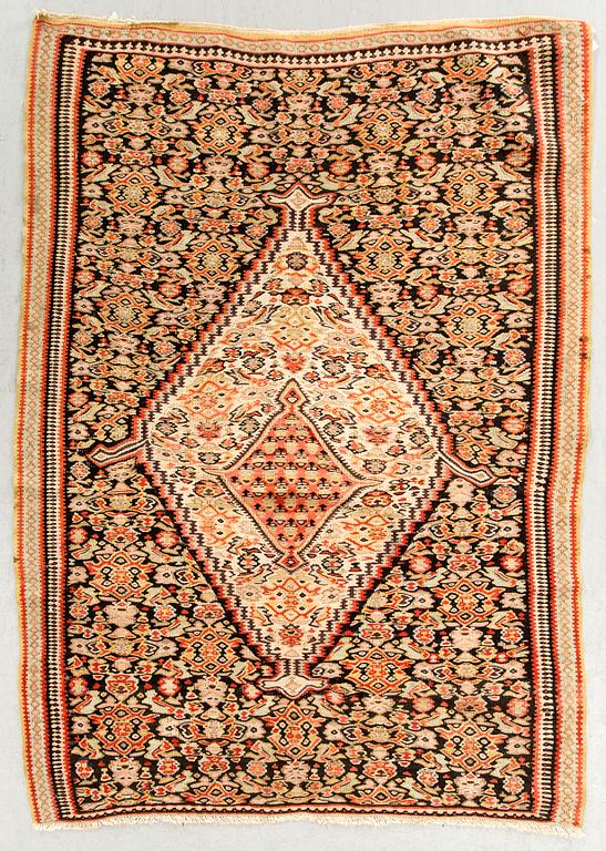 A semiantique Senneh carpet ca 159 x 106 cm.