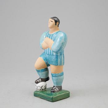 A Lisa Larson stoneware figure of a football player, Gustavsberg.