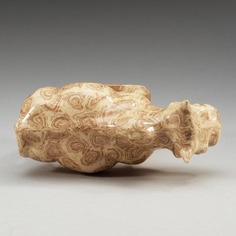 A glazed pottery figure of an ox, Tang dynasty (618-907).