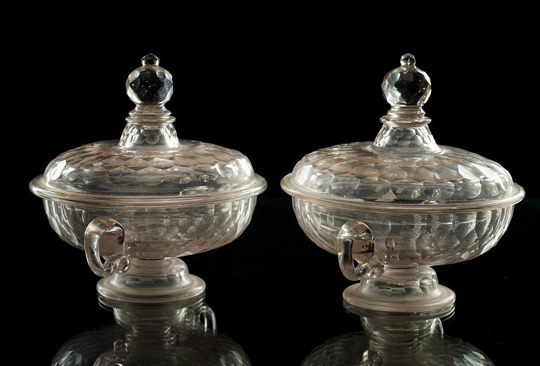 A pair of cut glas butter tureens with cover, 18th Century.