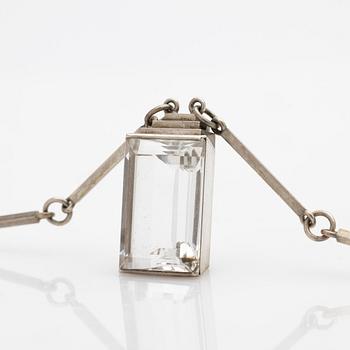 Wiwen Nilsson, Pendant, sterling silver with faceted rock crystal, Lund 1944.