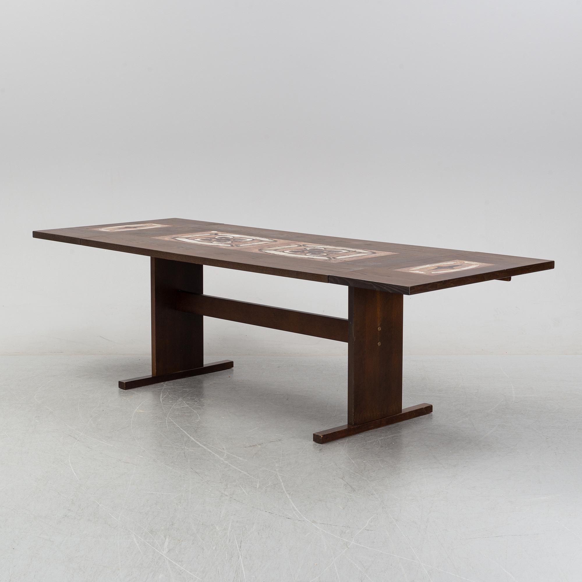 A Danish dining table and eight chairs from Gangsø Møbler A/S, 1960's-70's.