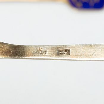 Anton Michelsen, Annual/Christmas cutlery, 8 pieces, gilt sterling silver and enamel, Denmark, 1930s–40s.