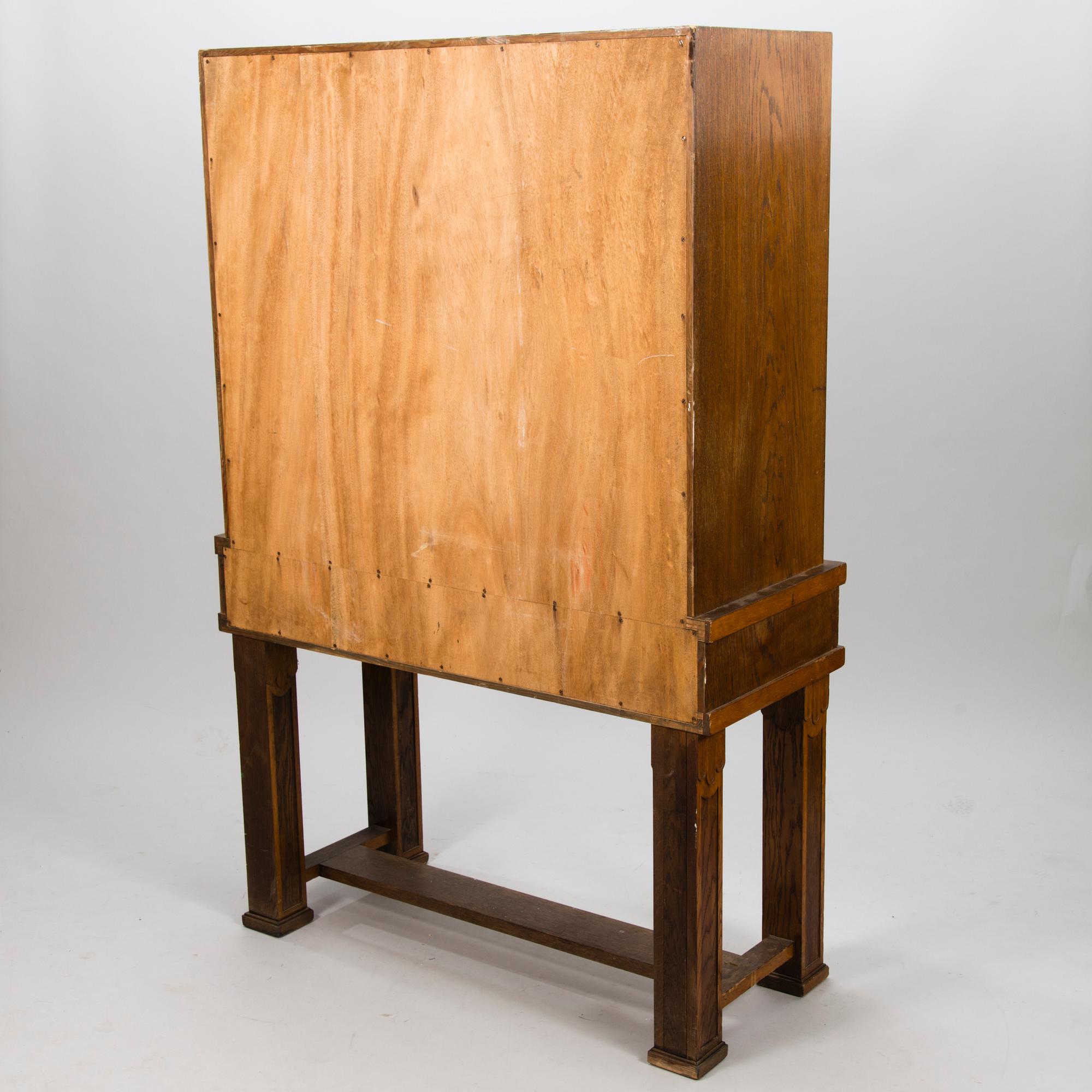 A 1920's oak cabinet.