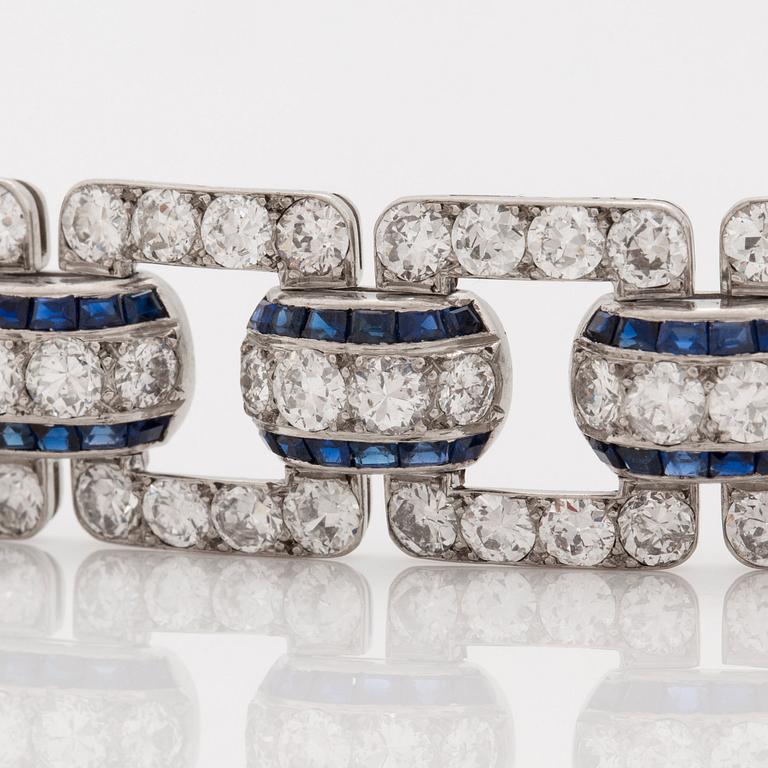 An Art Deco step cut sapphire and  old- cut diamond bracelet.