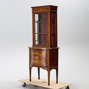 Display cabinet, circa 1900.