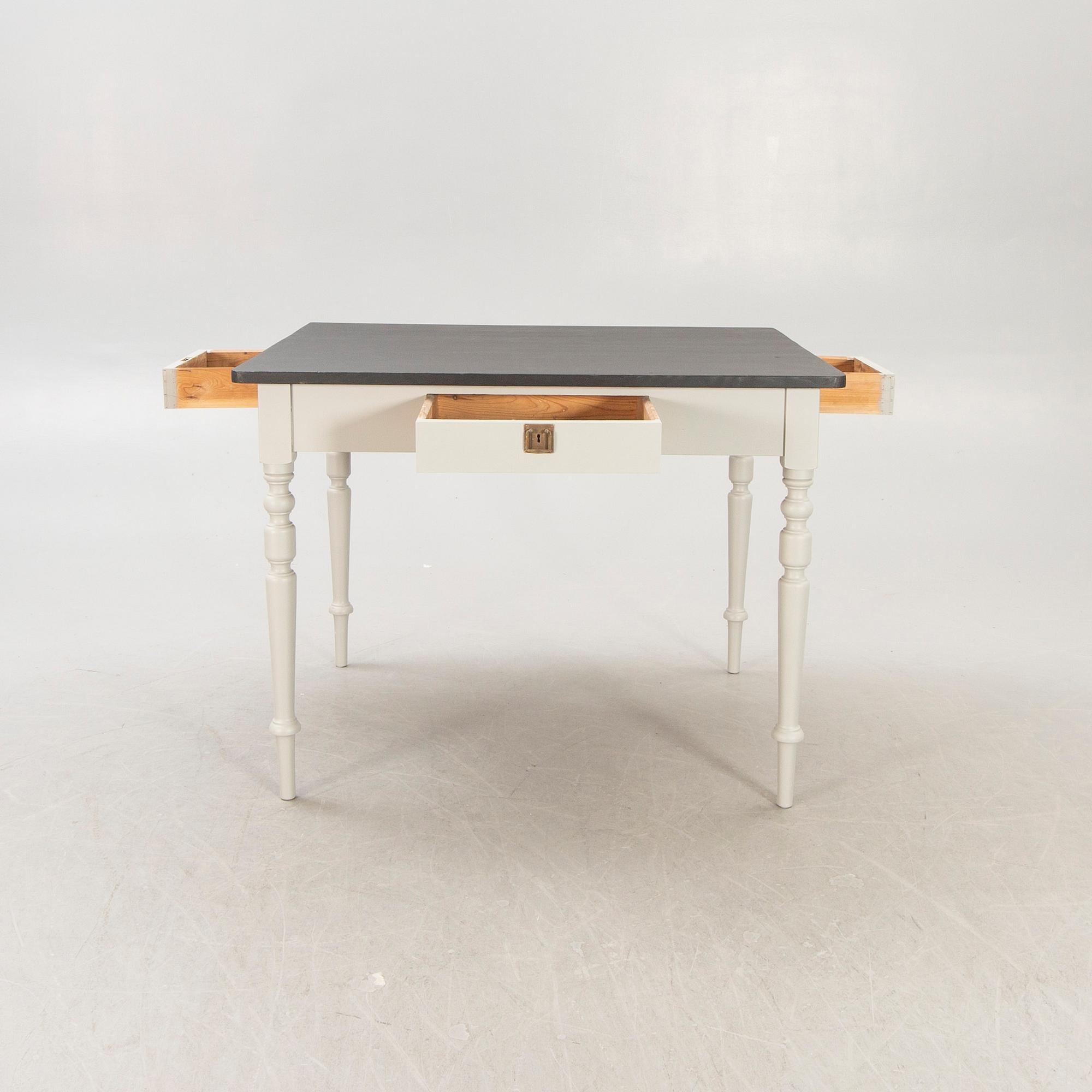 A painted working table later part of the 19th century.