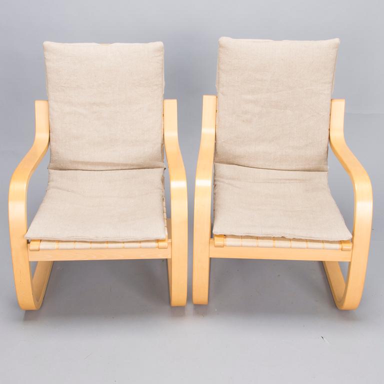 ALVAR AALTO, Pair of model '406' armchairs for Artek, late 20th century .