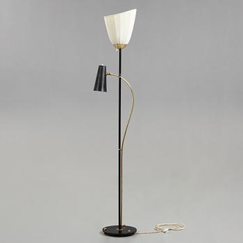 A Swedish Modern brass and black lacquered floor lamp, 1950's.