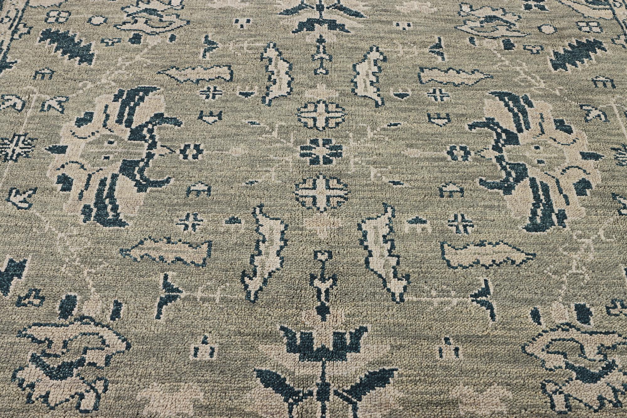 An oriental carpet with Mamluk design, c. 372 x 277 cm.